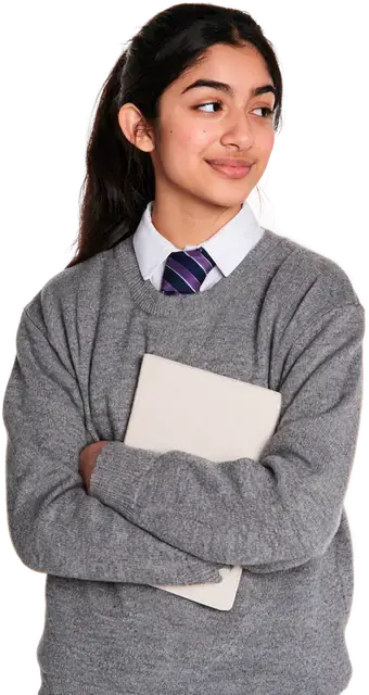 Secondary school student holding an exercise book
